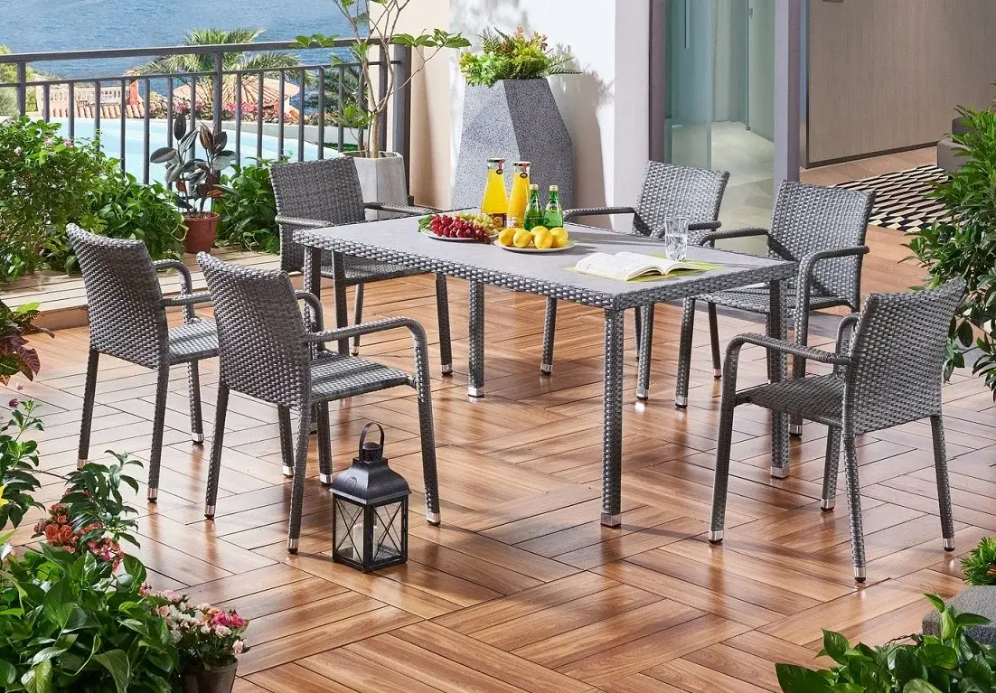 PE rattan dining chairs and table set for outdoor hospitality projects